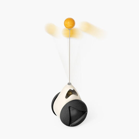 GlowSpin™ When the cat is playing, the toy can swing back and forth freely without falling over. Driven by the self-weight module at the bottom, the toy can be moved forward or backward by swinging. When the product is laid horizontally, the toy can also