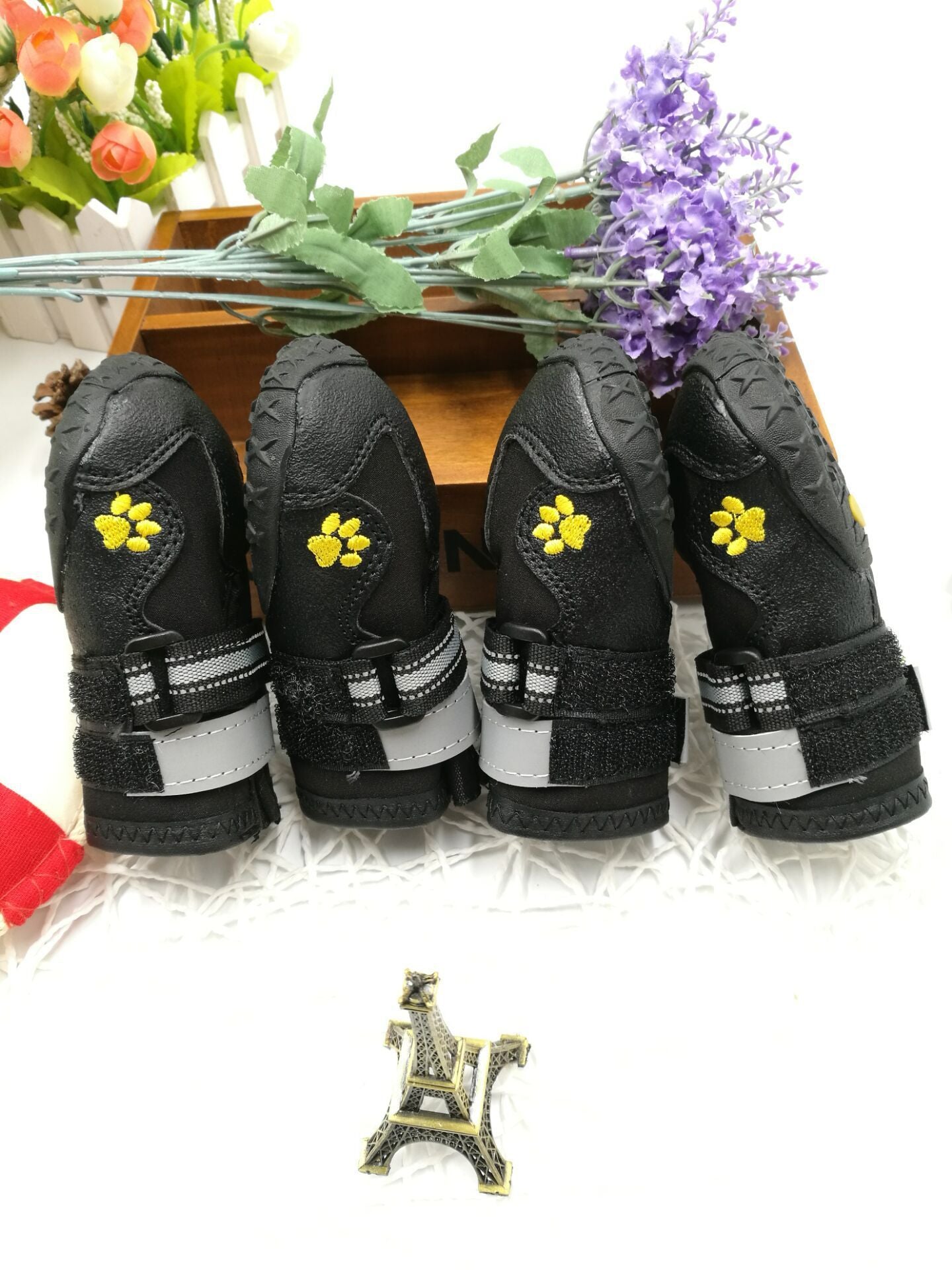 PawTrek™ Everyday Dog Shoes Features: 1. Waterproof PVC sole helps keep your feet dry, so dogs can wear them on light snow or muddy and wet streets. 2. The non-slip sturdy sole provides a protective layer to withstand hot and cold surfaces such as ice and