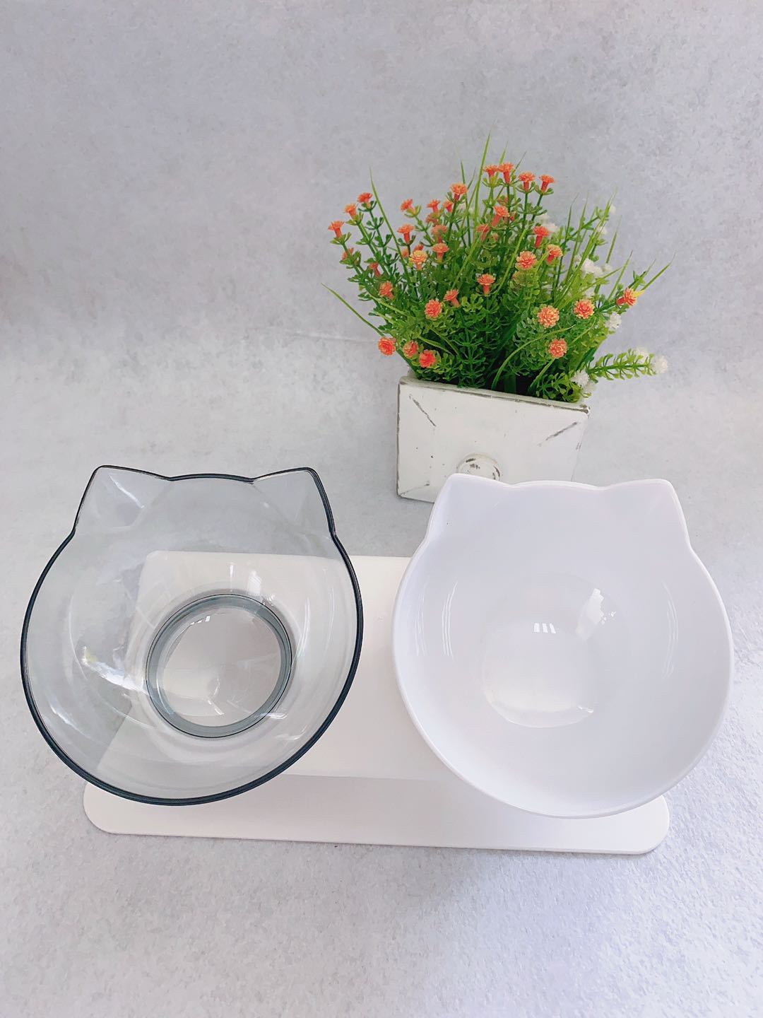 FurSpine Cat Feeder Product information: Shape:Round Material: Plastic Complete automatic feeding: Yes Product No.: Cat head transparent double bowl Color: Transparent cat head bowl Easy to clean transparent bowl: For dogs and cats Transparent bowl of cat