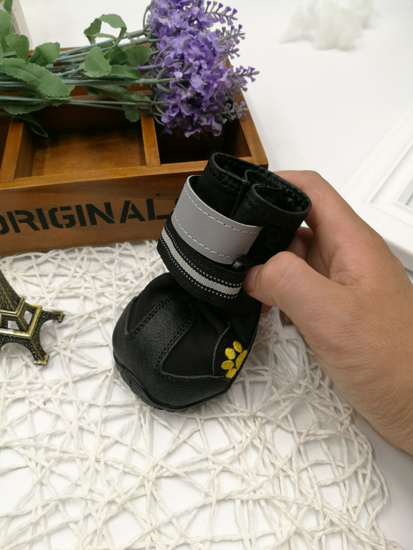 PawTrek™ Everyday Dog Shoes Features: 1. Waterproof PVC sole helps keep your feet dry, so dogs can wear them on light snow or muddy and wet streets. 2. The non-slip sturdy sole provides a protective layer to withstand hot and cold surfaces such as ice and