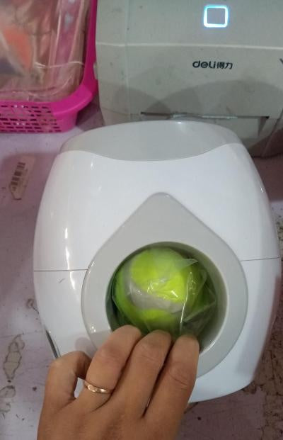 PlaySnack Overview: 1. This is a good helper to train your dogs. --Training your dog to put the ball into the machine --Wait for the ball roll out along the track (Please note the ball does not fly out by being launched) 2. The snack will also roll out al