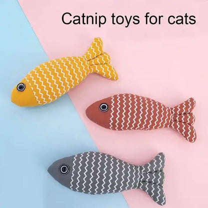 Interactive Catnip Fish – Teething & Play Pillow for Kittens Cozy Companion: Our catnip fish kicker toys are all made of soft plush material and baby-level cotton, soft and comfortable enough for your feline friends to snuggle and chew. Organic Catnip Fil