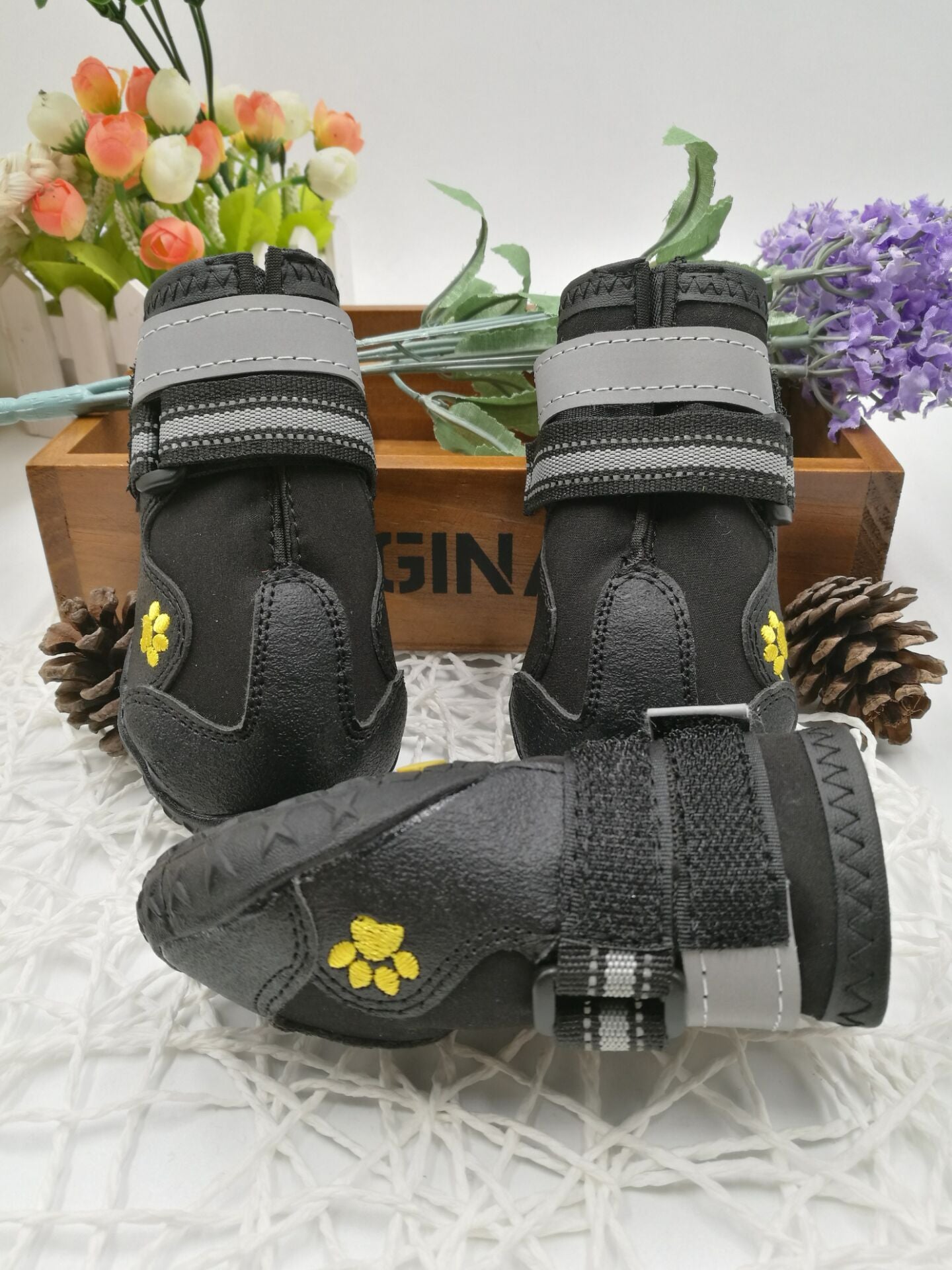 PawTrek™ Everyday Dog Shoes Features: 1. Waterproof PVC sole helps keep your feet dry, so dogs can wear them on light snow or muddy and wet streets. 2. The non-slip sturdy sole provides a protective layer to withstand hot and cold surfaces such as ice and