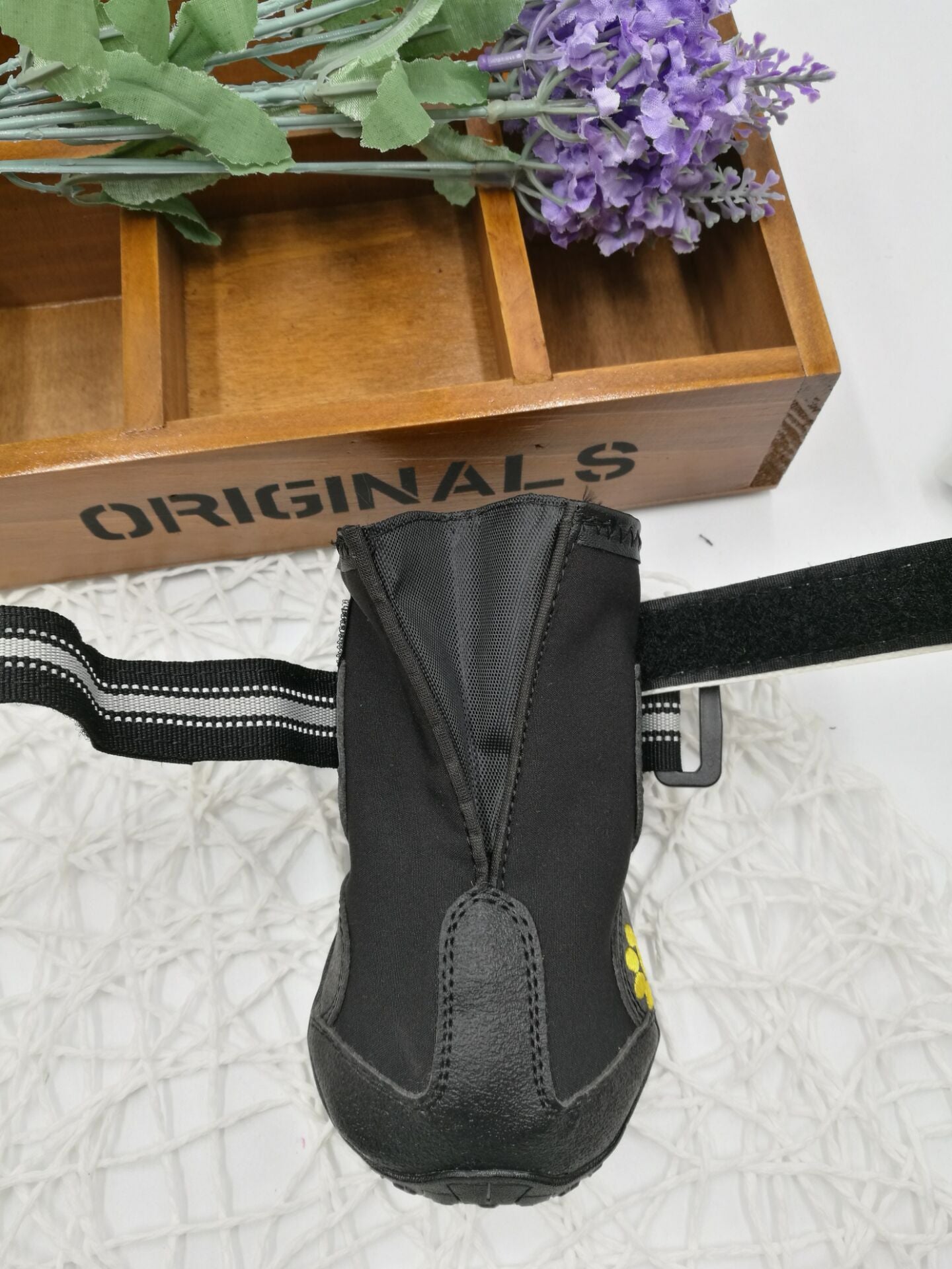 PawTrek™ Everyday Dog Shoes Features: 1. Waterproof PVC sole helps keep your feet dry, so dogs can wear them on light snow or muddy and wet streets. 2. The non-slip sturdy sole provides a protective layer to withstand hot and cold surfaces such as ice and