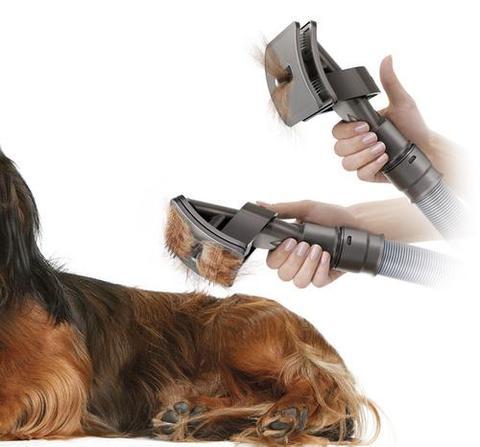 VacuGroom™ – Pet Brush Attachment for Vacuum Cleaners Product information: This grooming tool removes loose hair directly from your dog before it's shed around the home. Collected hair is then sucked straight into the vacuum. Mess-free vacuum-assisted dog
