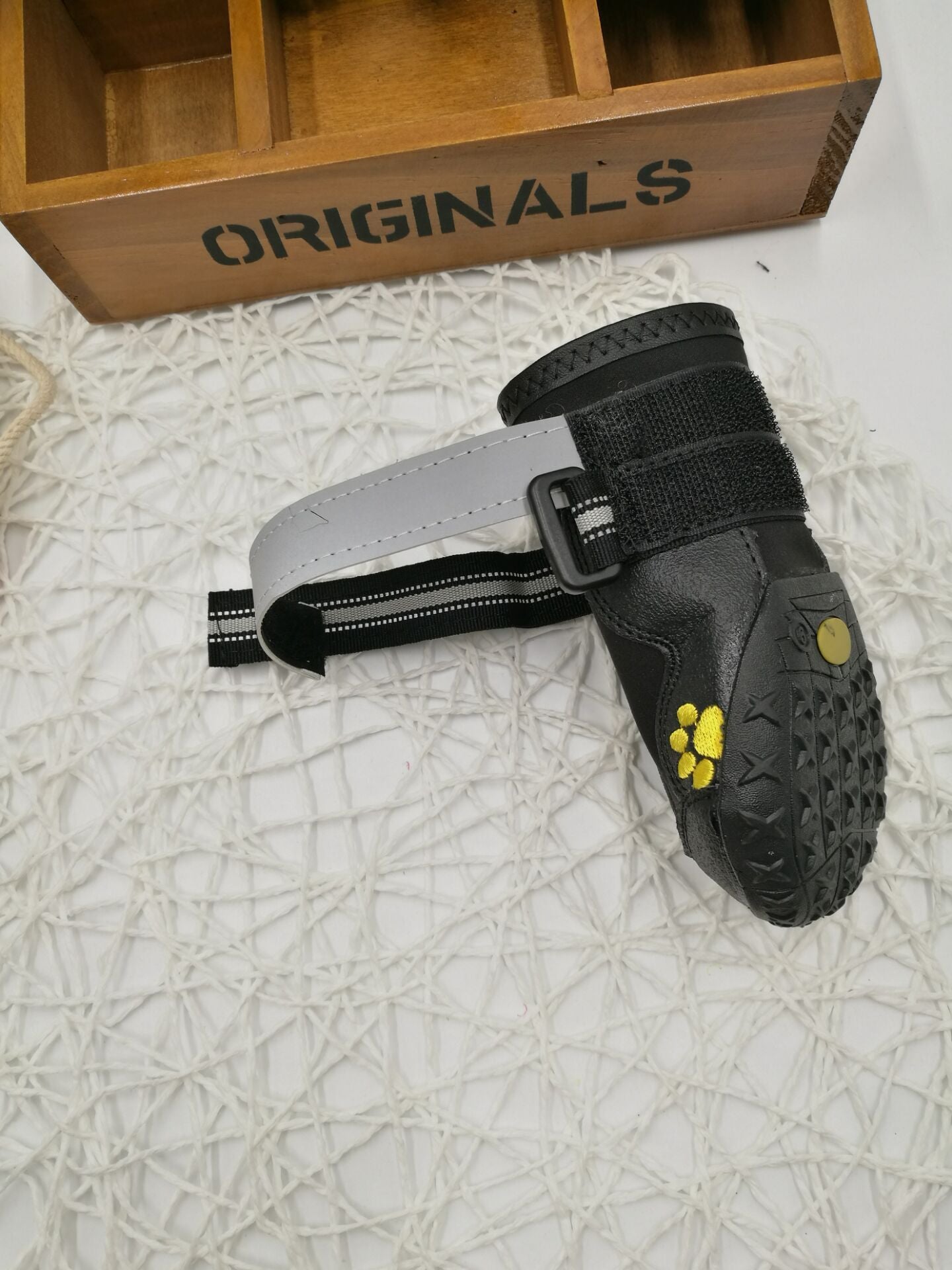 PawTrek™ Everyday Dog Shoes Features: 1. Waterproof PVC sole helps keep your feet dry, so dogs can wear them on light snow or muddy and wet streets. 2. The non-slip sturdy sole provides a protective layer to withstand hot and cold surfaces such as ice and