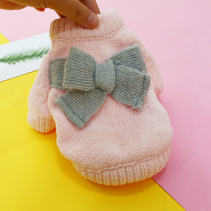 Cute Pet Sweater – Hollow Knit with Bow for Small Dogs & Cats Overview: 1. Winter Essential: This dog sweater is made of warm and comfortable knitted fabric, brings the warmth to your pet, no longer afraid of cold. 2. Popular Pattern: Designed with lattic