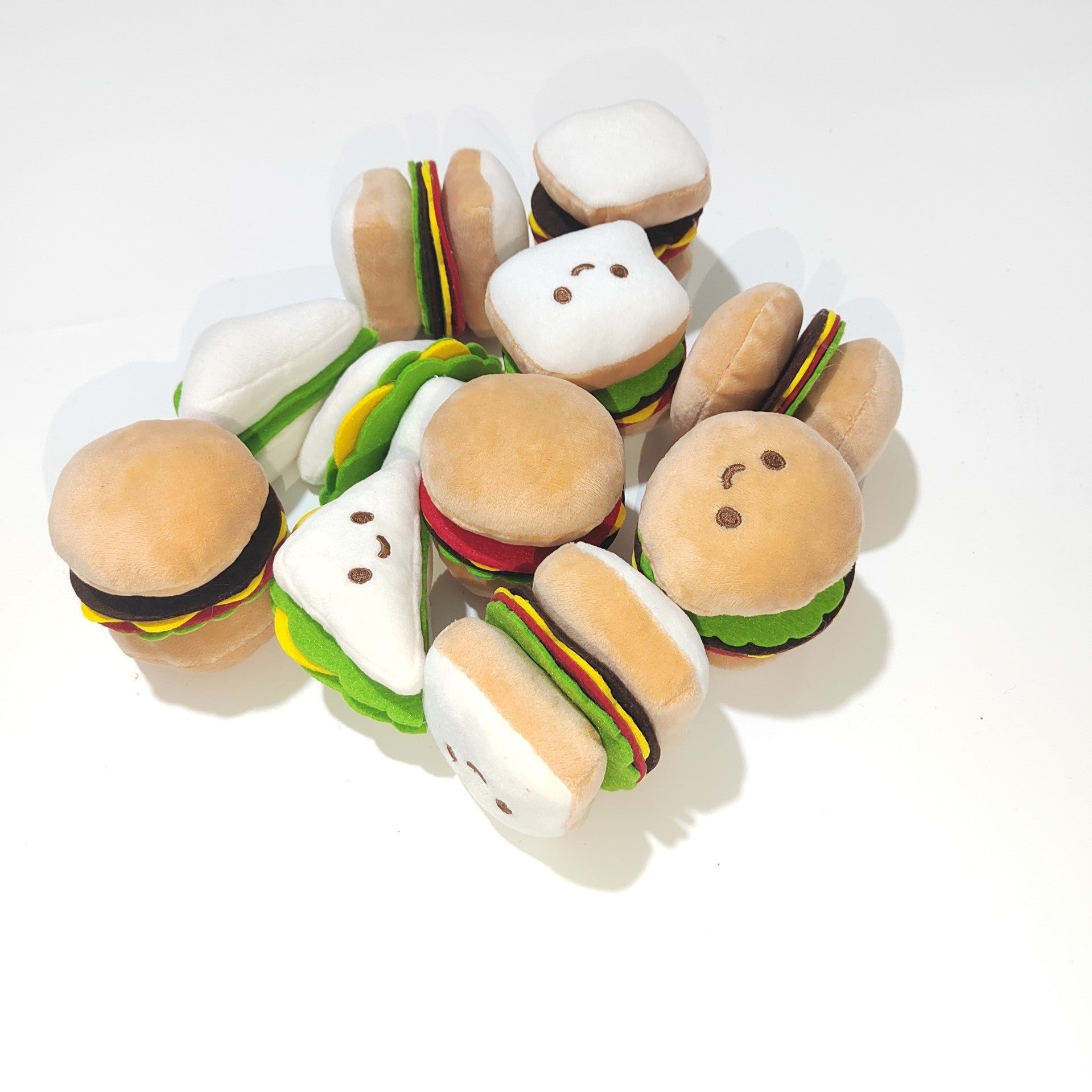 Squeaky Hamburger Toy – Fun Stress Relief for Pets Product information: Color: Hamburger, sandwich, rice ball Material: Plush Category: Pet Toys Product Name: Pet sounding toy Product size: 7*7 * 8CM (hamburger). 10*6 * 5C M (rice balls)7*7 * 7C M (sandwi