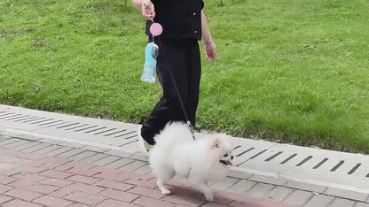 FurGo Multi-Cup Overview: 1. 3-in-1 Design: This pet water bottle features a built-in 300ml water, 100g food container, and waste bag compartment, providing all-in-one convenience for pet owners on the go. 2. Built-in Filtration System: The water dispense